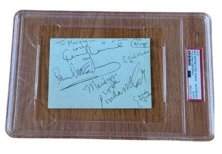 Beatles: Paul McCartney & Wings (Early Lineup) Signed Album Page (PSA/DNA Encapsulated): Fantastic light blue 3.5" x 5" album page beautifully signed by Paul McCartney along with fellow Wings members Linda McCartney, Denny Laine, and Denny Seiwell. Each autograph is penned in bold&#160;bl