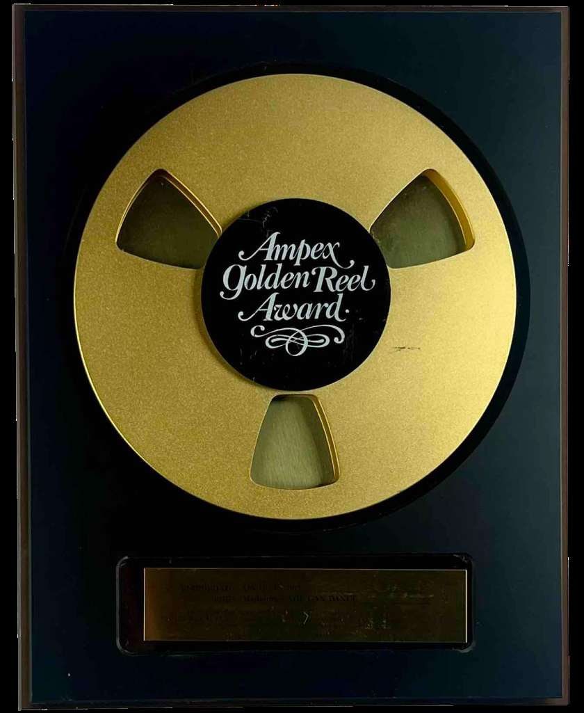 Madonna "You Can Dance" Ampex Golden Reel Award Presented to The Hit Factory: Ampex Golden Reel Award presented to The Hit Factory for Madonna’s 1987 remix album "You Can Dance." This honor was awarded by Ampex Corporation to recognize outstanding recording and commercial