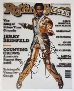 Jerry Seinfeld In-Person Signed 14" x 11" Rolling Stone Cover Photo (Third Party Guaranteed): Color 14" x 11" photo featuring Jerry Seinfeld in a gold Elvis-style outfit from his iconic Rolling Stone magazine cover, signed with a lesser-seen full-name signature in black felt tip marker. I