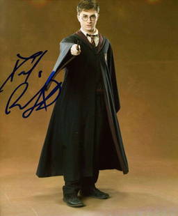 Harry Potter: Daniel Radcliffe Signed 10" x 8" Photo (ACOA): Quintessential&#160;10" x 8" color photo of Daniel Radcliffe in character as Harry Potter, boldly hand-signed in blue marker. In fine condition. A striking piece for Harry Potter fans, capturing the m