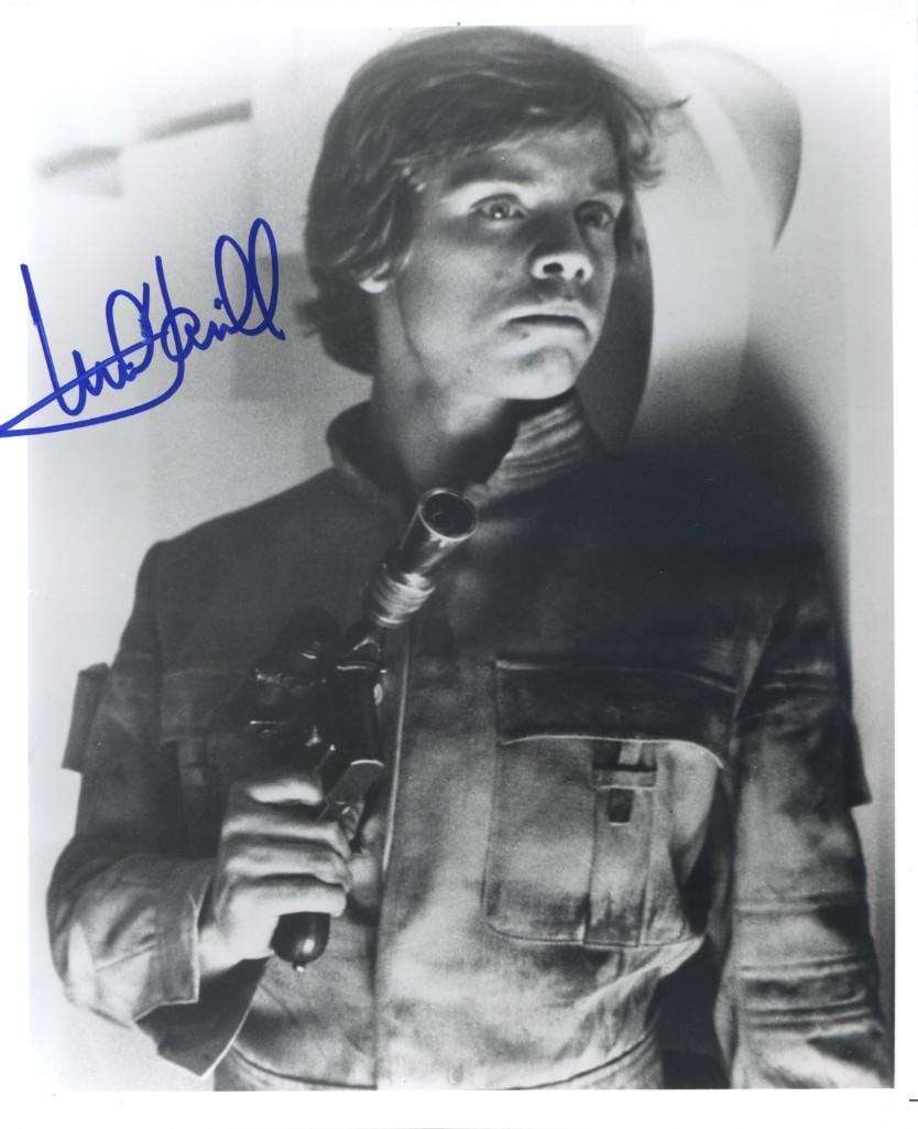Star Wars: Mark Hamill Signed 10" x 8" Photo from "Empire Strikes Back" (Beckett/BAS Authentication): Dramatic black and white 10" x 8" photo of Mark Hamill as Luke Skywalker from Star Wars: The Empire Strikes Back, signed boldly in blue felt tip marker by Hamill. Capturing the young Jedi in one of hi