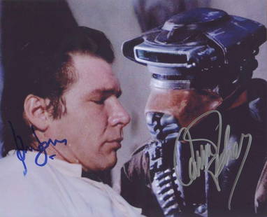 Star Wars: Harrison Ford & Carrie Fisher Signed 8" x 10" Photo "Return of the Jedi" (BAS): Scarce 8" x 10" color photo from Star Wars: Return of the Jedi, featuring Harrison Ford and Carrie Fisher in costume as Han Solo and Princess Leia disguised as the bounty hunter Boushh inside Jabba&#8