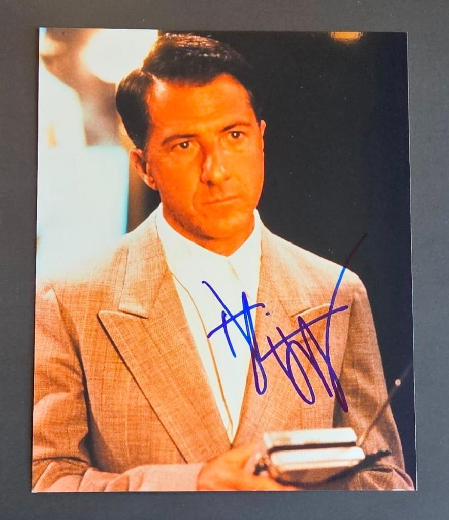 Dustin Hoffman Signed 10" x 8" "Rainman" Photo (Third Party Guaranteed): Color 10" x 8" photo signed in blue felt tip marker by actor Dustin Hoffman in the film "Rainman." In fine condition. Obtained in-person. Provenance Eaton & Brennan Auctions guarantees this lot t