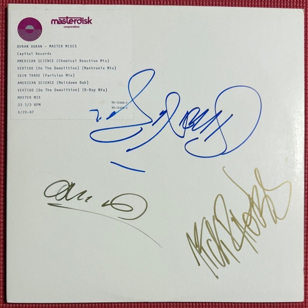 Duran Duran Group Signed "Master Mixes" Double LP (3 Sigs) (Epperson Authentication): "Master Mixes" album signed on the cover in blue and gold felt tip markers by Duran Duran bandmembers Simon Le Bon, John Taylor and Nick Rhodes. Measuring approximately 12" x 12" and in fine cond