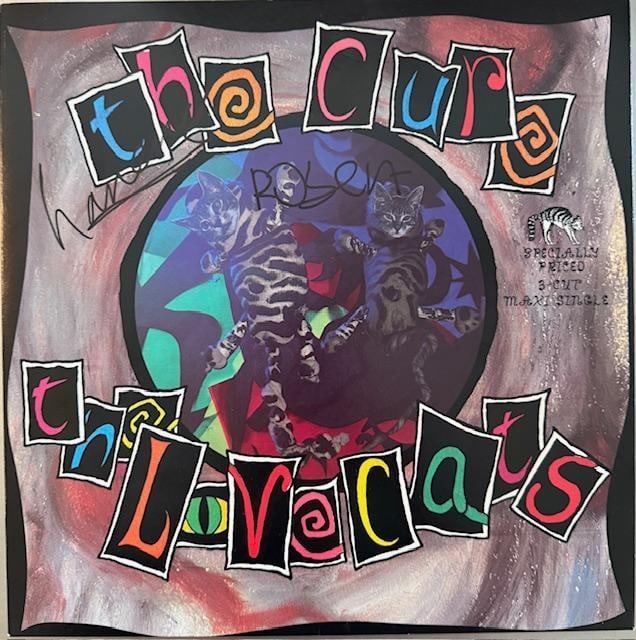 The Cure Group Signed "The Lovecats" LP (2 Sigs) (Third Party Guaranteed): "The Lovecats" LP signed on the cover in black felt tip marker by The Cure bandmembers Robert Smith and Lol (Laurence) Tolhurst. Measuring approximately 12" x 12" and in fine condition. Record is incl