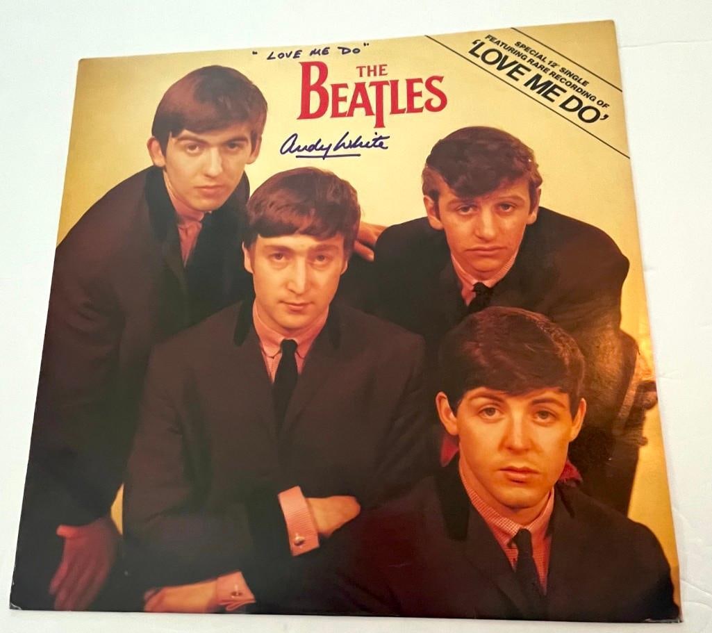 The Beatles: Andy White Signed "Love Me Do" LP (Third Party Guaranteed): "Love Me Do" LP signed on the cover in blue felt tip marker by "Love Me Do" drummer (briefly replacing Ringo Starr) Andy White. Record included. Measuring approximately 12" x 12" and in fine condition