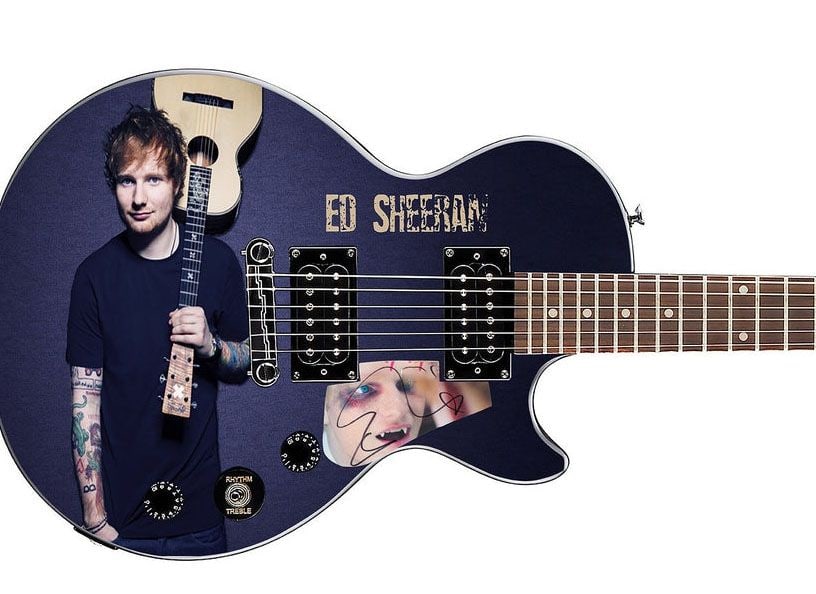 Ed Sheeran Graphics Epiphone Les Paul-Style Guitar w/ Custom-Made Signed Pickguard (REAL Auth.): Ed Sheeran graphics Epiphone Les Paul-style guitar signed on the custom-made pickguard in black felt tip marker by musician Ed Sheeran. Measuring 41” x 17” x 3” and in fine condition