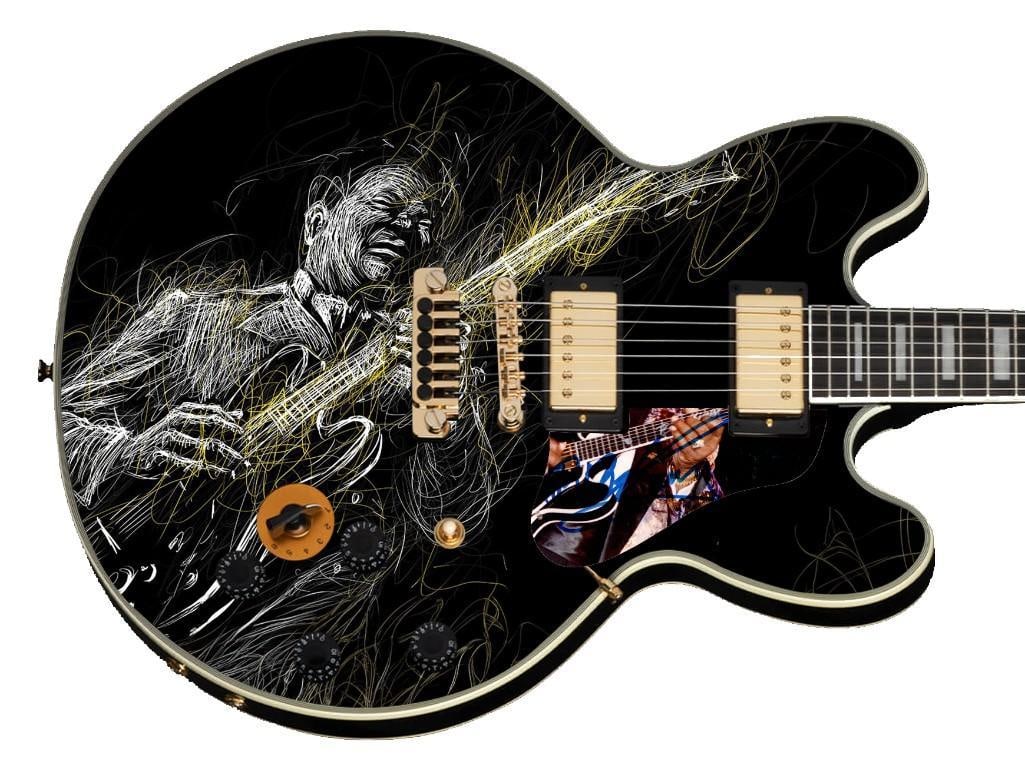 B.B. King Gibson Epiphone Lucille-Style Guitar w/ Custom-Made Signed Pickguard (REAL Authentication): B.B. King Gibson Epiphone Lucille-style guitar signed on the custom-made pickguard in blue felt tip marker by musician B.B. King. Measuring 43” x 16.5” x 1.75” and in fine condition.
