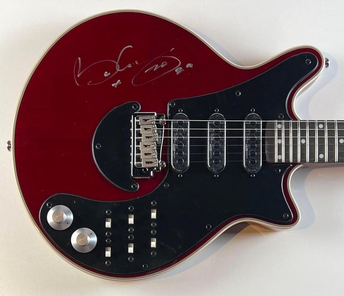 Queen: Brian May Signed “Red Special” Edition Guitar (Third Party Guaranteed): Sought-after “Brian May” Special Edition electric guitar, signed on the body in silver felt tip marker by Queen guitarist Brian May. Measuring approximately 38.5" x 14" x 1.5" and in fine