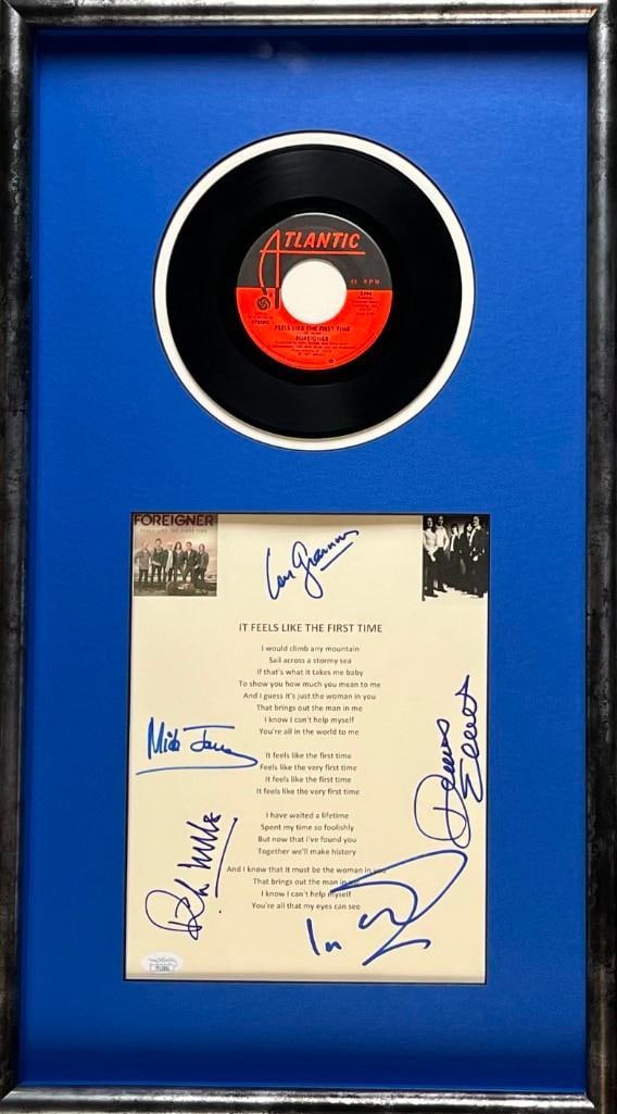 Foreigner “Feels Like the First Time” 45 & Signed Lyric Sheet in Framed Display (5 Sigs): “Feels Like the First Time" lyric sheet signed in blue felt tip marker by Foreigner band members Lou Graham, Mick Jones, Dennis Elliott, Ian McDonald, and Rick Willis. The signed lyric shee