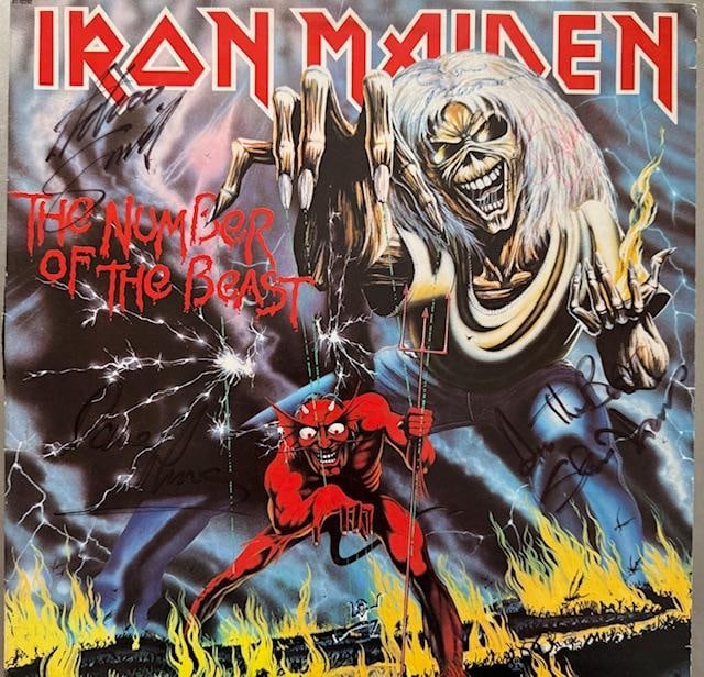 Iron Maiden Fully Group Signed “Number of the Beast” LP (5 Sigs) (JSA Authentication): “Number of the Beast” LP signed on the cover in black felt tip marker, and red and blue ballpoint pen by Iron Maiden bandmembers Bruce Dickinson, Steve Harris, Dave Murray, Adrian Smi