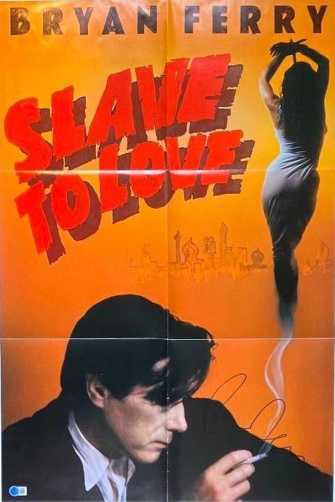 Roxy Music: Bryan Ferry Signed 30" x 20" Fold-Out Poster (Beckett/BAS Authentication): Color 30" x 20" fold-out poster signed in blue felt tip marker by Roxy Music frontman Bryan Ferry. In fine condition. Authenticated by Beckett/BAS, with their official hologram affixed to the front bo