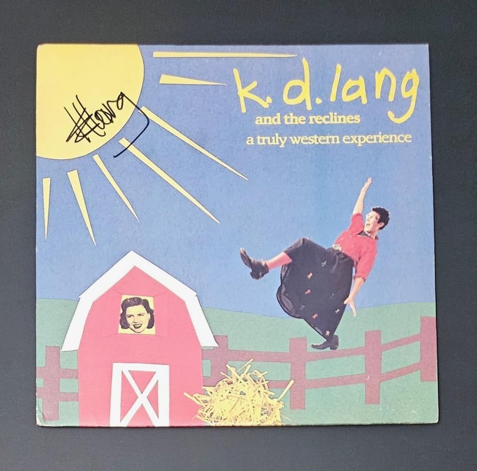 K.D. Lang Signed "A Truly Western Experience" Album (Third Party Guaranteed): "A Truly Western Experience" album signed on the cover in black felt tip marker by musician K.D. Lang. Measuring approximately 12" x 12" and in fine condition. Record is included. Obtained