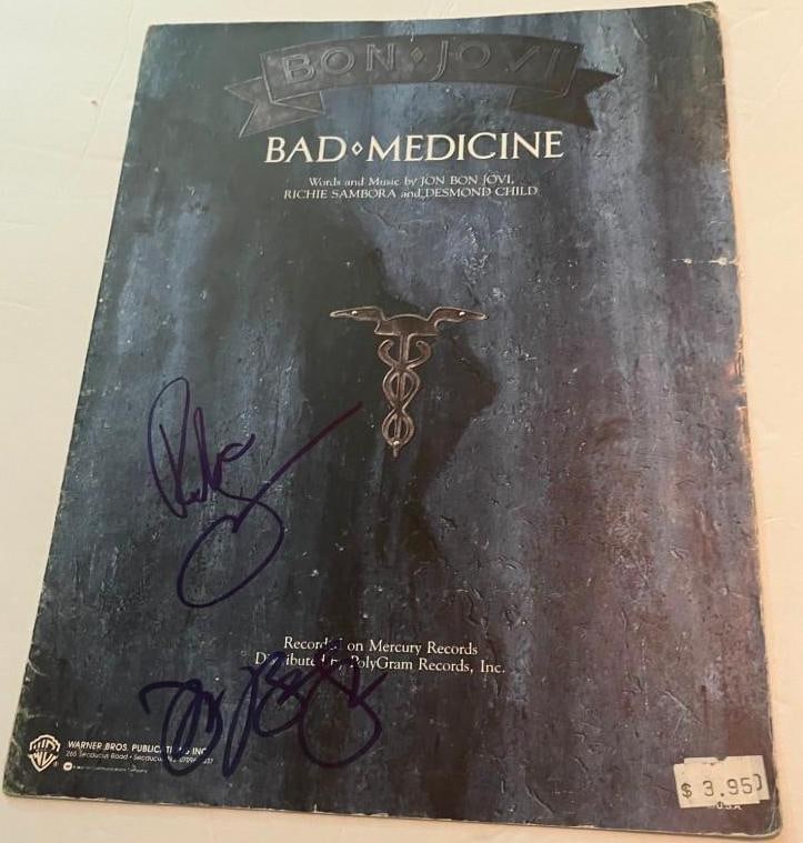 Bon Jovi Group Signed "Bad Medicine" Sheet Music (2 Sigs) (Third Party Guaranteed): "Bad Medicine" sheet music signed on the cover in blue felt tip marker by Bon Jovi band members John Bon Jovi and Richie Sambora. In fine condition.ProvenanceEaton & Brennan Auctions guarantees this