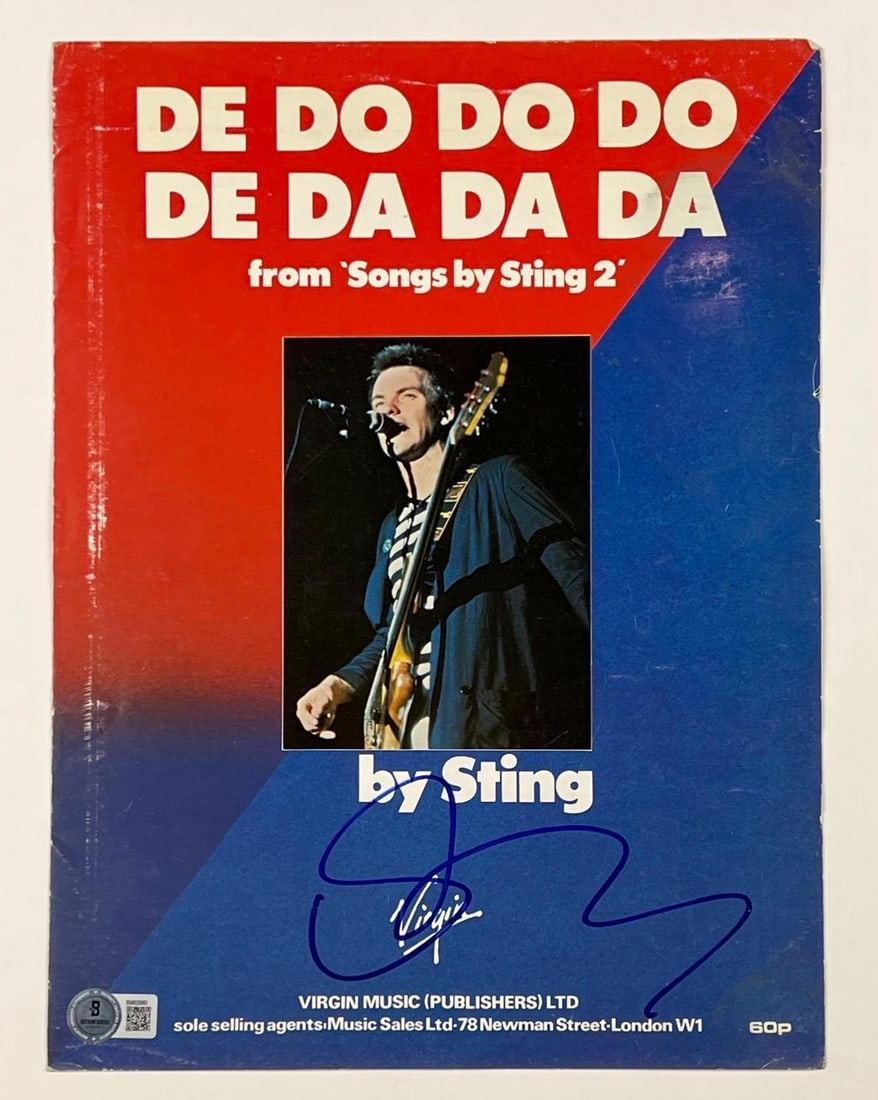 The Police: Sting Signed 12" x 9" "De Do Do Do De Da Da Da" Sheet Music (Beckett/BAS): Color 12" x 9" "De Do Do Do De Da Da Da" sheet music signed on the cover in blue felt tip marker by The Police front man Sting. In very good condition, with some signs of scattered wear. Obtained in-p