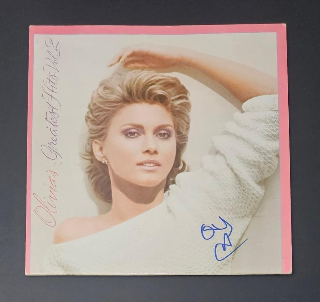 Olivia Newton-John Signed "Olivia's Greatest Hits Vol. 2" Album (Third Party Guaranteed): "Olivia's Greatest Hits Vol. 2" album signed on the cover in blue felt tip marker by actor Olivia Newton-John with her abbreviated signature. Record is included. Obtained in-person.ProvenanceEaton &