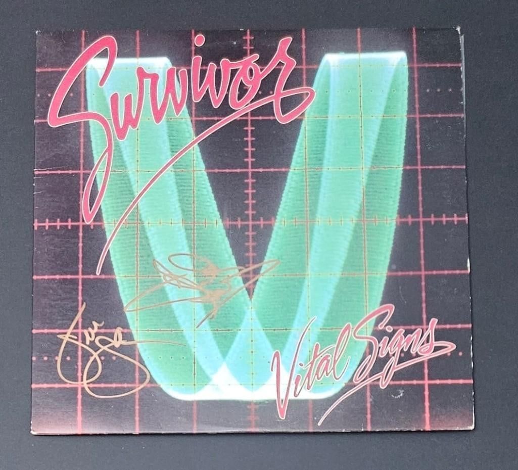 Survivor Group Signed "Vital Signs" Album (2 Sigs) (Third Party Guaranteed): "Vital Signs" album signed on the cover in gold felt tip marker by Survivor band members Jimi Jamison and Frankie Sullivan. Measuring approximately 12" x 12" and in fine condition. Record is