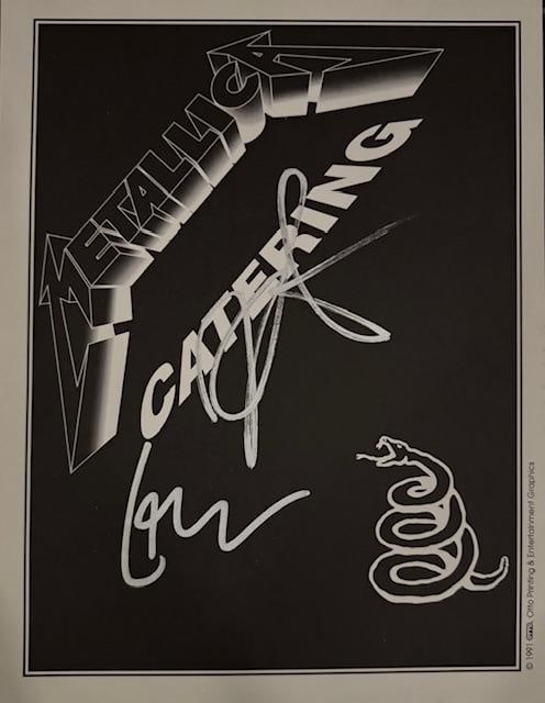 Metallica Group Signed 11" x 8.5" Catering Sign (2 Sigs) (JSA Authentication): Black-and-white 11" x 8.5" catering sign used on Metallica's "Black Album" tour, signed in silver felt tip marker by Metallica band members Kirk Hammett and Lars Ulrich. In fine condition.
