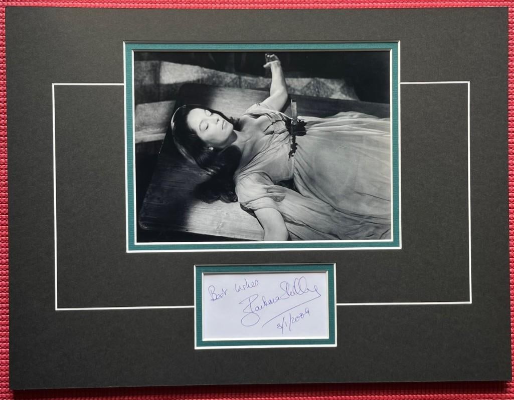 Barbara Shelley Signed 12" x 16" "Dracula: Prince of Darkness" Matted Photo & Card: Black-and-white 12" x 16" matted photo of Helen Kent from the film "Dracula: Prince of Darkness," below a card signed in blue ballpoint pen by actress Barbara Shelley. Shelley added the inscription