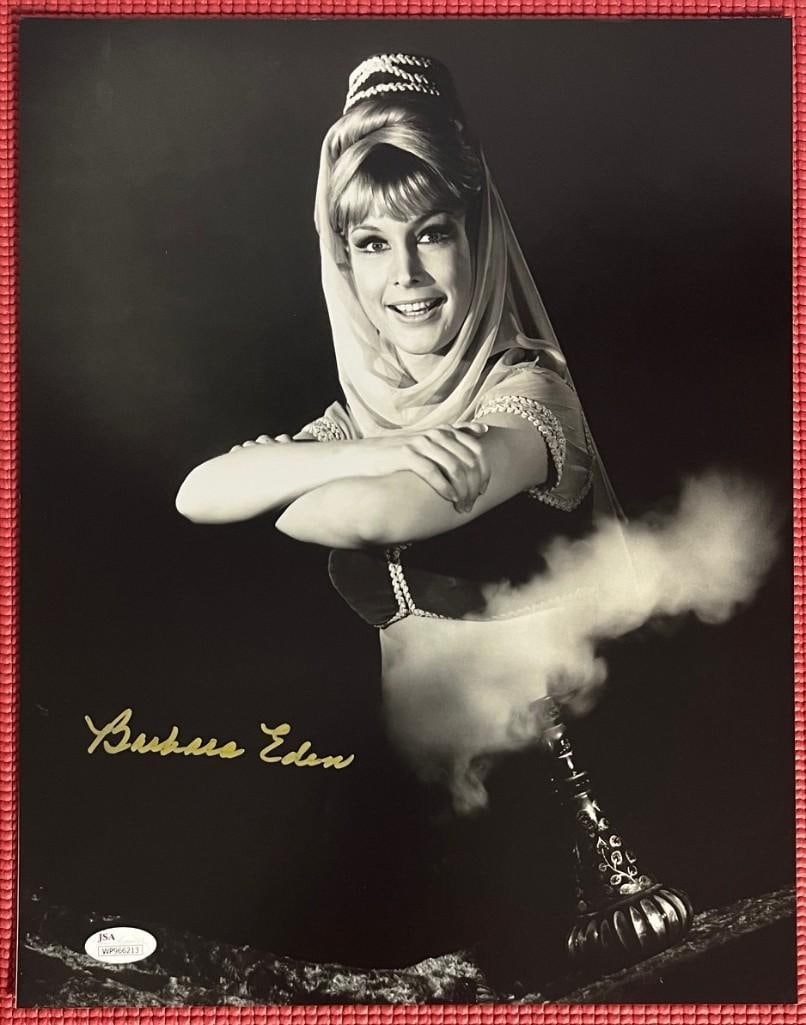 Barbra Eden Signed 14" x 11" "I Dream of Jeannie" Photo (JSA Authentication): Black-and-white 14" x 11" photo of Jeannie from the television show "I Dream of Jeannie" signed in gold felt tip marker by actress Barbara Eden. In fine condition. Accompanied by a JSA certification