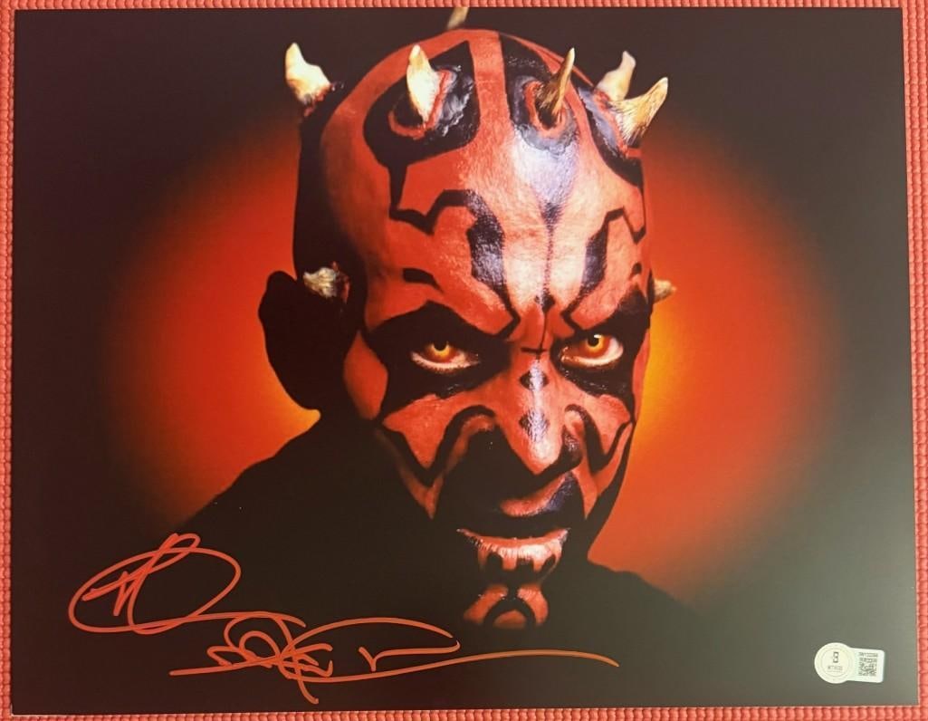 Star Wars: Ray Park Signed 11" x 14" Photo as Darth Maul (Beckett/BAS Authentication): Color 11" x 14" photo of Darth Maul from the film "Star Wars: The Phantom Menace" signed in red felt tip marker by actor Ray Park. In fine condition. Authenticated by Beckett/BAS, with their official