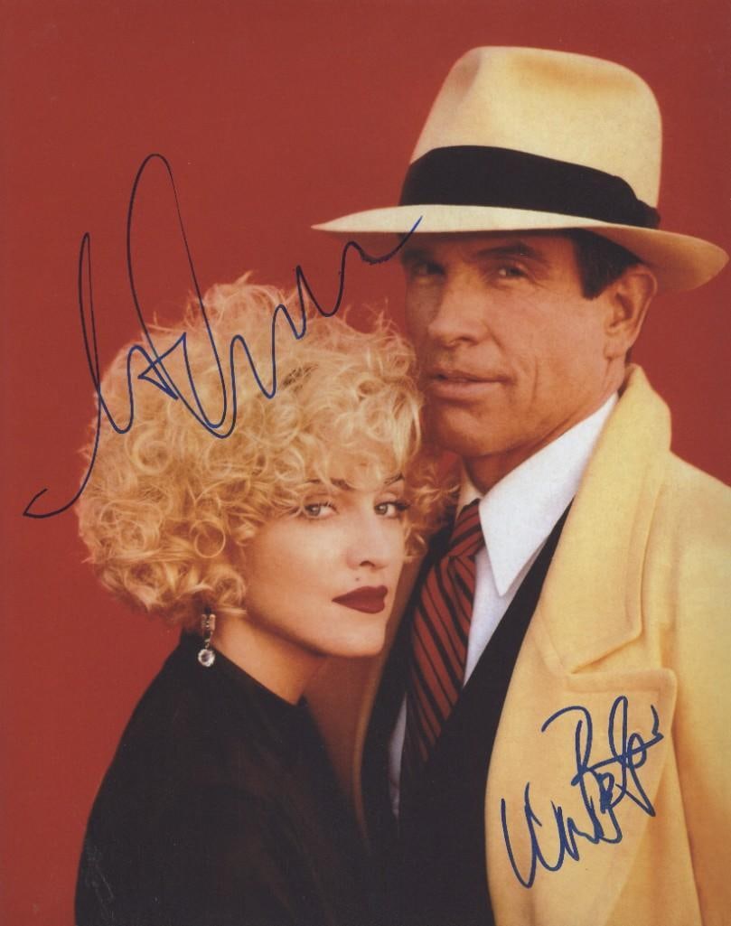Dick Tracy: Madonna & Warren Beatty Signed 14" x 11" Photo (2 Sigs) (ACOA Authentication): Rare color 14" x 11" photo signed in blue felt tip marker by musician and actress Madonna and actor Warren Beatty as they starred together in "Dick Tracy." In fine condition. Obtained in-person.