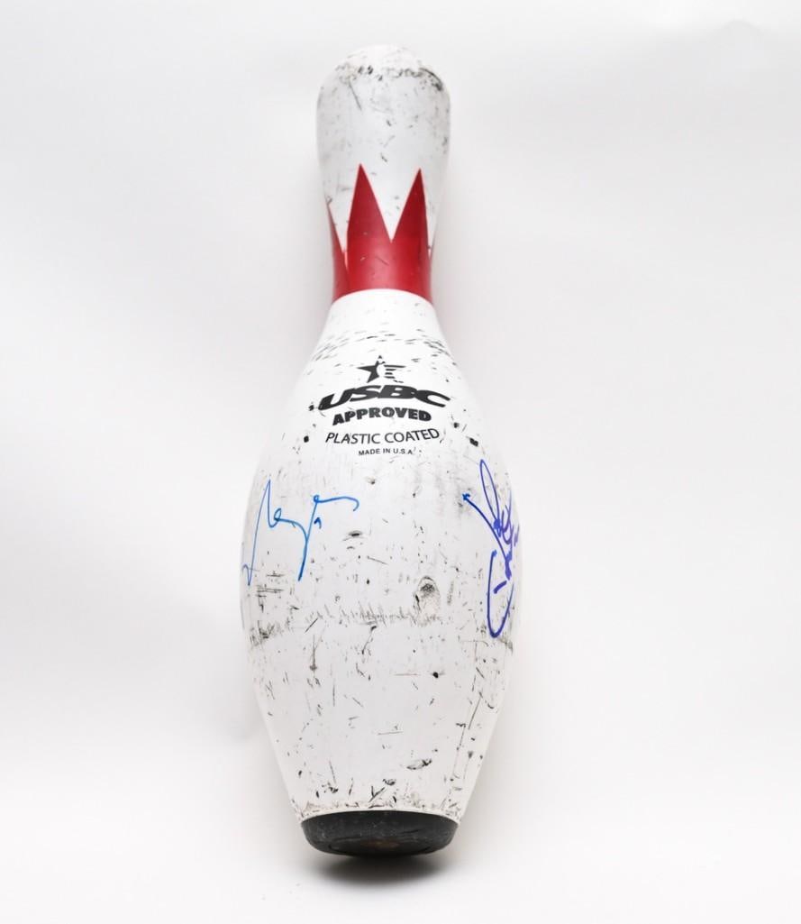 Jeff Bridges & John Goodman Signed 15" "The Big Lebowski" Bowling Pin (Third Party Guaranteed): Brunswick Score King brand white 15" bowling pin with a red triangular trim around the neck, signed around the belly in blue felt tip marker by actors Jeff Bridges and John Goodman. In very good condi