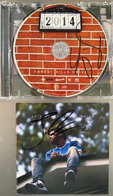 J. Cole Signed “Forest Hill Drive” CD (JSA Authentication): "Forest Hill Drive” CD signed on the CD disc and the booklet in black felt tip marker by musician J. Cole. Measuring approximately 5” x 5” and in fine condition. Accompanied by a ful