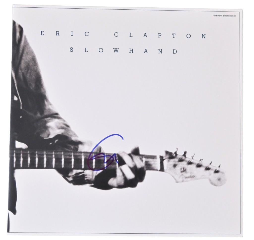 Eric Clapton Signed "Slowhand" Album (ACOA Authentication): "Slowhand" album signed on the cover in blue felt tip marker by musician Eric Clapton. Measuring approximately 12" x 12" and in fine condition. Record is included. Obtained in-person. One of Clapton's