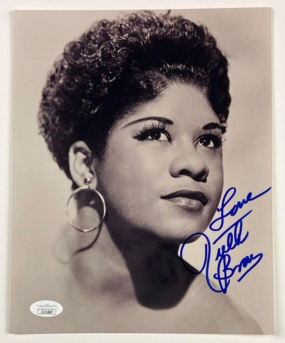 Ruth Brown Signed 10" x 8" Photo (JSA Authentication): Black-and-white 10" x 8" photo signed in blue felt tip marker by singer Ruth Brown, who also inscribed "Love" before her name. In fine condition. Obtained in-person. Accompanied by a JSA