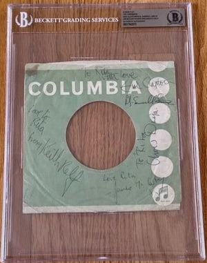 Yardbirds Group Signed Slabbed "I Wish You Would" 45 Sleeve (5 Sigs) (Beckett/BAS & JSA Auth.): "I Wish You Would" 45 sleeve signed on the cover in black ballpoint pen by the Yardbirds band members James McCarty, Chris Dreja, Keith Relf, Eric Clapton, and Paul Samwell Smith. Each signature is in