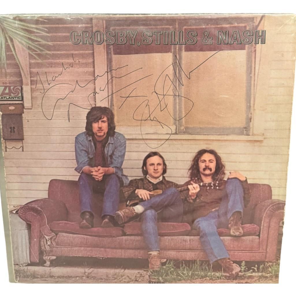 CSN: Stills & Nash Signed Self-Titled Album (2 Sigs) (Third Party Guaranteed): "Crosby, Stills & Nash" album signed on the cover in black ballpoint pen by Crosby, Stills, & Nash band members Graham Nash, who also inscribed "Thanks!" before his signature, and Stephen Stills. Meas