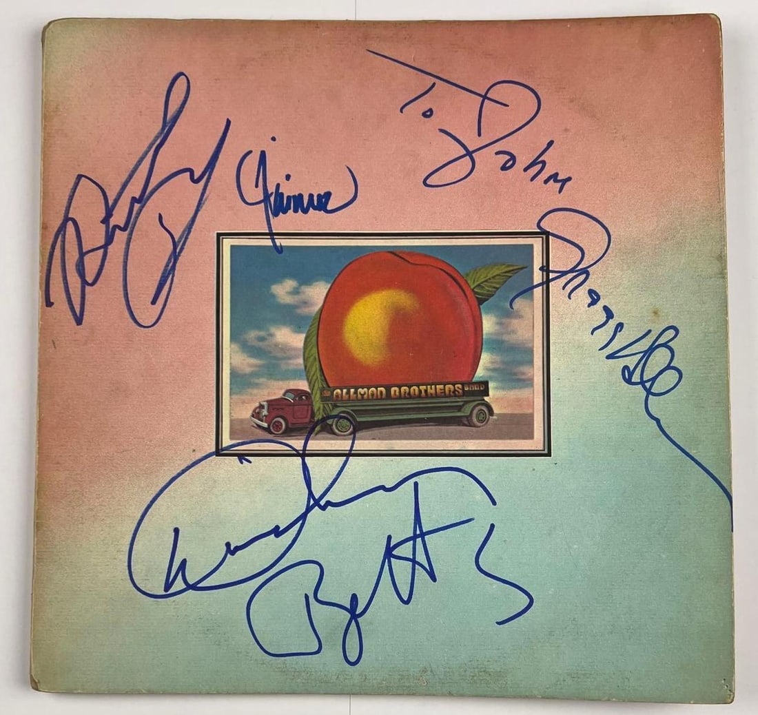Allman Brothers Band Group Signed "Eat a Peach" Album (4 Sigs) (Beckett/BAS Authentication): "Eat a Peach" double album signed on the cover in blue felt tip marker by the Allman Brothers Band band members Dickey Betts, Greg Allman, Jaimoe, and Butch Trucks. Allman also inscribed the message