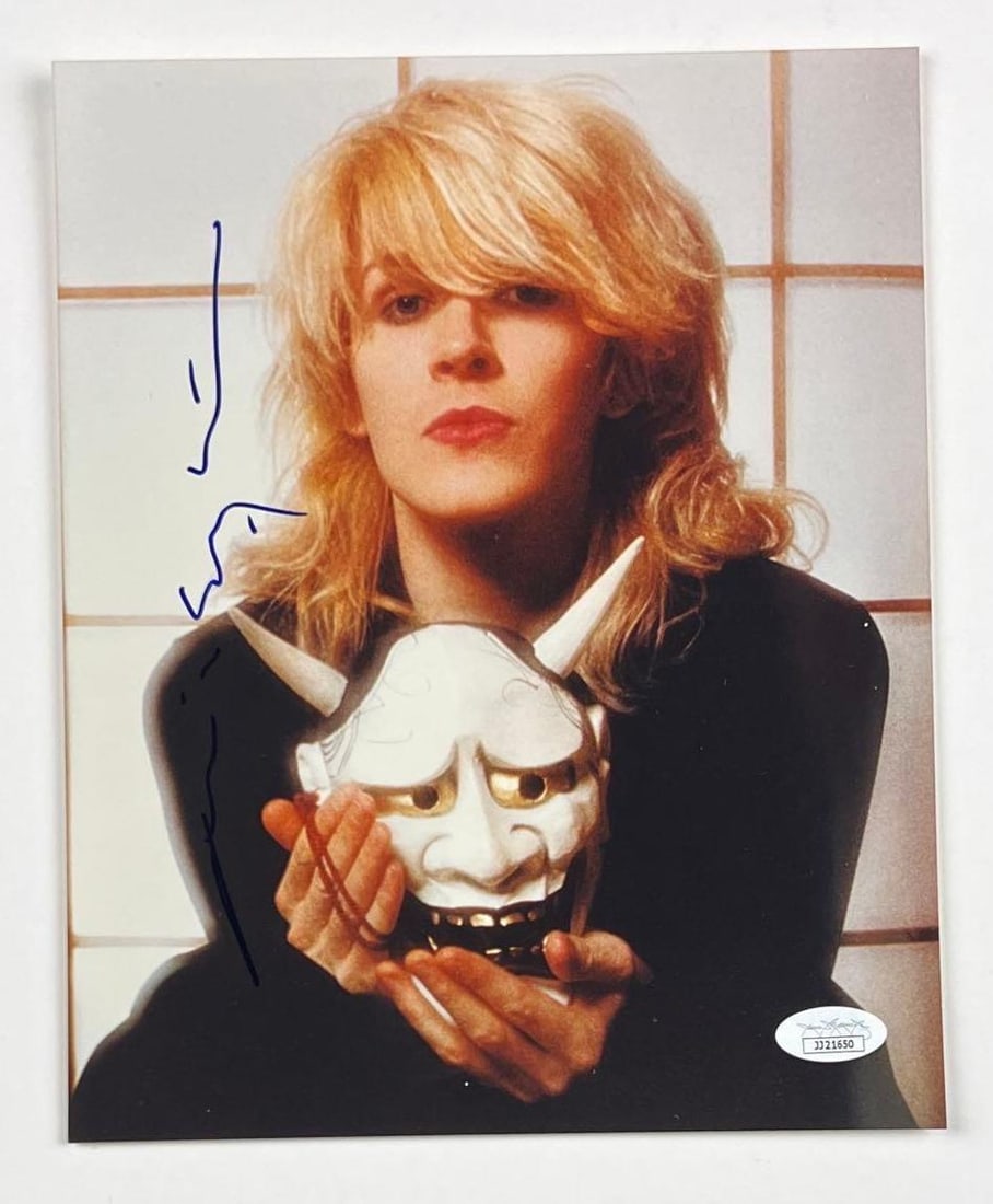 Japan: David Sylvian Signed 10" x 8" Photo (JSA Authentication): Color 10" x 8" photo signed in blue felt tip marker by Japan band member David Sylvian. In fine condition. Obtained in-person. Accompanied by a JSA certification (#JJ21650).