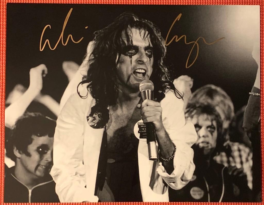 Alice Cooper Signed 11" x 14" "Department of Youth" Photo (Beckett/BAS Authentication): Black-and-white 11" x 14" "Department of Youth" photo signed in gold felt tip marker by musician Alice Cooper. In fine condition. Accompanied by a Beckett/BAS certification (#S34402).