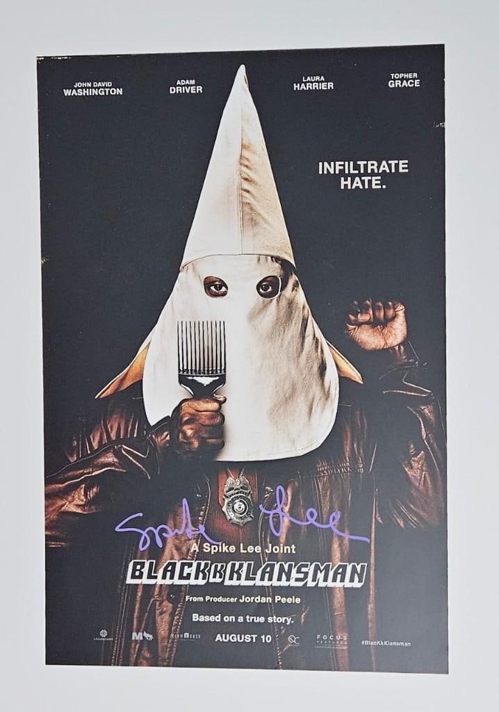 Spike Lee Signed 18" x 12" "Blackkklansman" Photo Poster (Third Party Guaranteed): Color 18" x 12" photo poster from the film "Blackkklansman" signed in purple paint marker by actor and director Spike Lee. In fine condition.ProvenanceEaton & Brennan Auctions guarantees this lot to