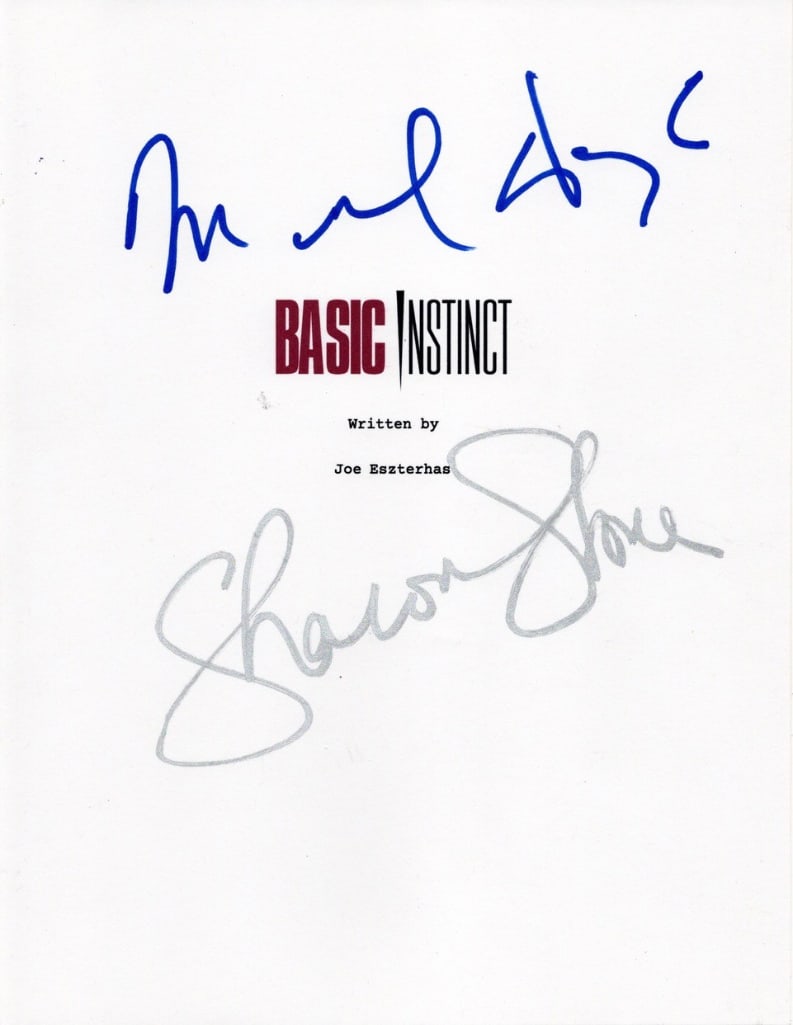 Basic Instinct Cast Signed Script Cover (2 Sigs) (Third Party Guaranteed): White 11" x 8.5" card stock paper script cover for the film Basic Instinct signed on the cover in blue felt tip marker by Michael Douglas and Sharon Stone. Measuring approximately 8.5" x 11" and in fi