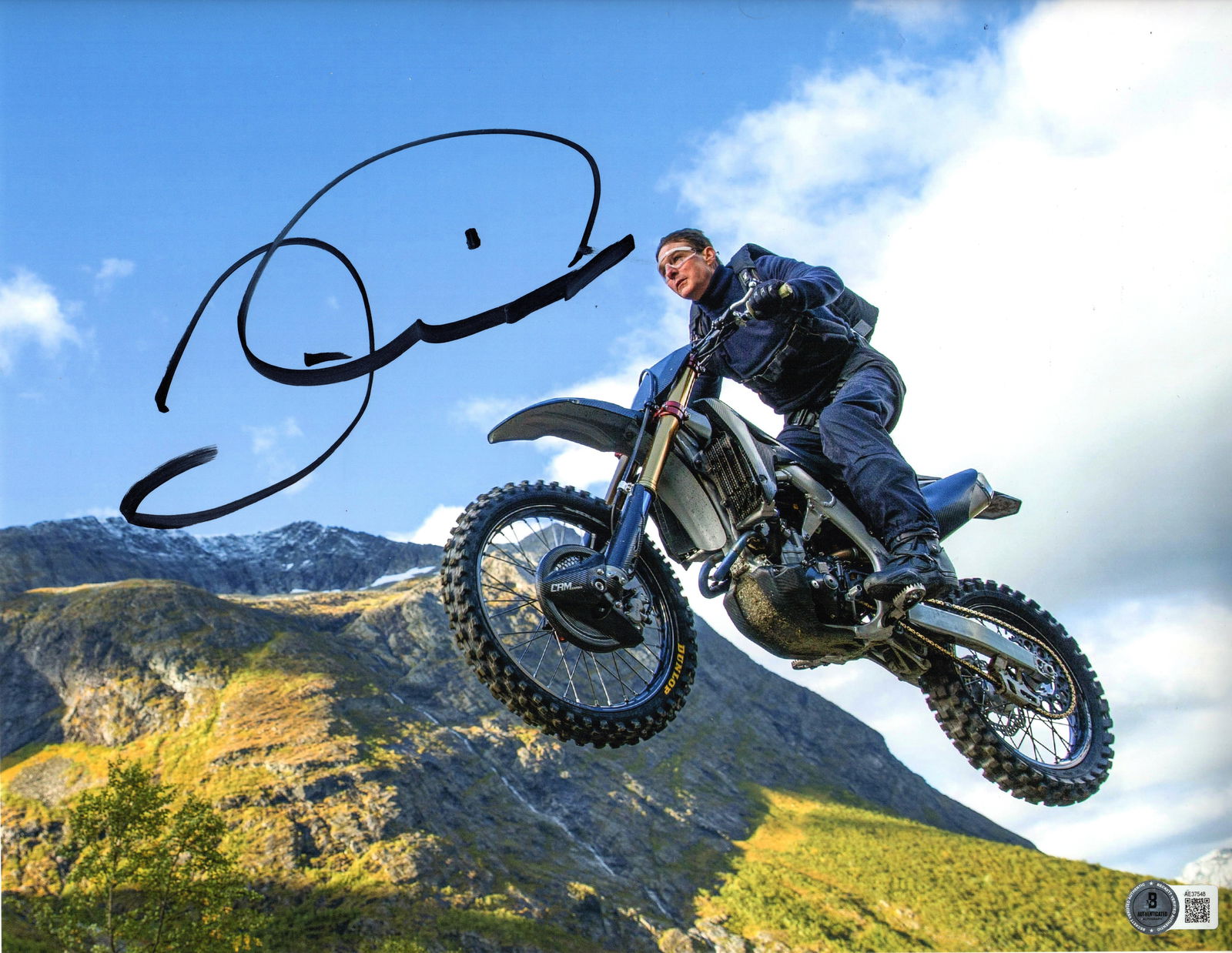 Mission Impossible: Tom Cruise Signed 14" x 11" Photo as Ethan Hunt (Beckett/BAS Authentication): Color 14" x 11" photo of character Ethan Hunt from the film "Mission Impossible" signed in black felt tip marker by actor Tom Cruise. In fine condition. Obtained in-person. Accompanied by a full