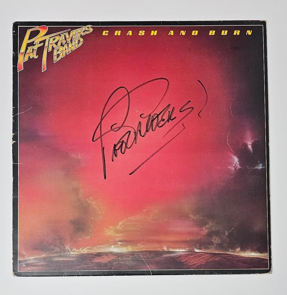 Pat Travers Signed "Crash and Burn" Album (Third Party Guaranteed): "Crash and Burn" album signed on the cover in black felt tip marker by musician Pat Travers. Measuring approximately 12" x 12" and in fine condition.ProvenanceEaton & Brennan Auctions guarantees this