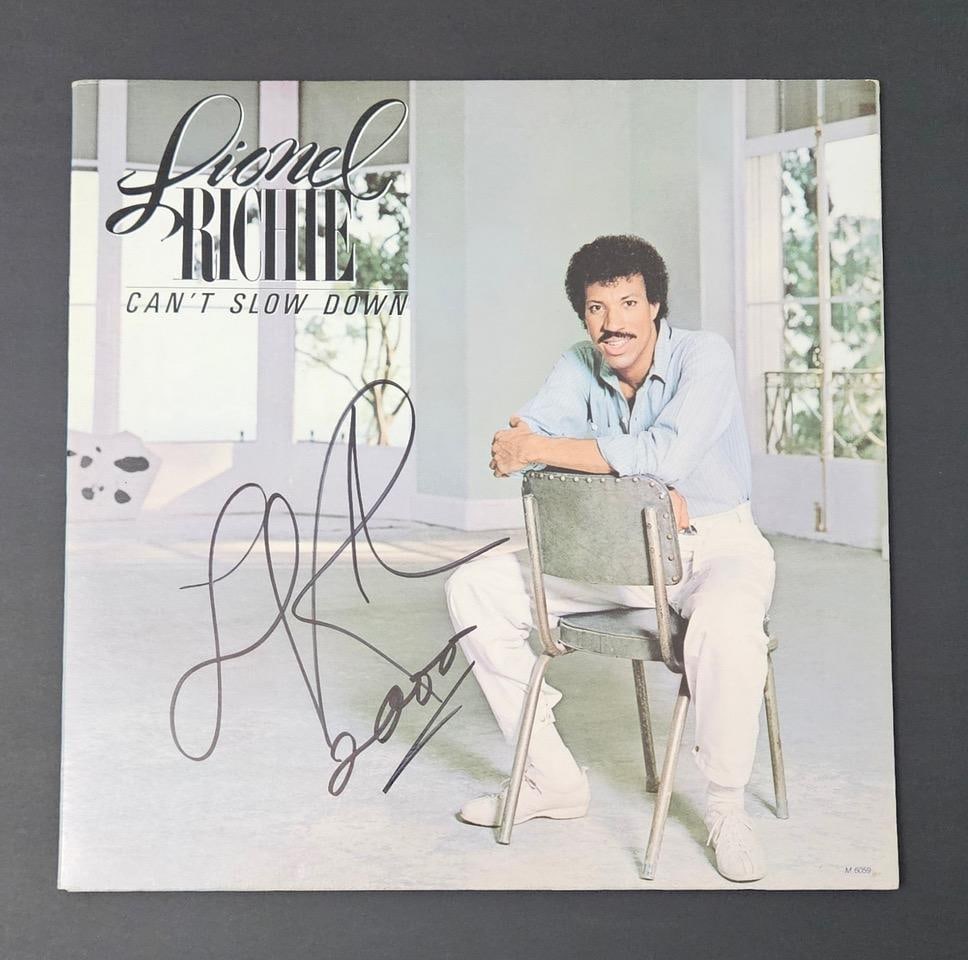Lionel Richie Signed "Can't Slow Down" Album (Third Party Guaranteed): "Can't Slow Down" album signed on the cover in black felt tip marker by musician Lionel Richie, who also inscribed the year "2000" after his signature. Measuring approximately 12" x 12" and in fine