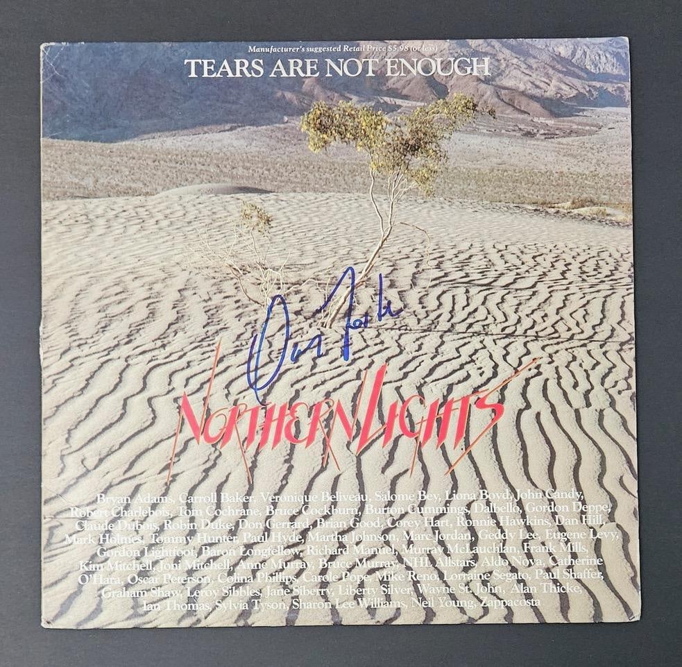 David Foster Signed "Tears are Not Enough" Album (Third Party Guaranteed): "Tears are Not Enough" album signed on the cover in blue felt tip marker by musician David Foster. Measuring approximately 12" x 12" and in fine condition. Provenance Eaton & Brennan Auctions guarante