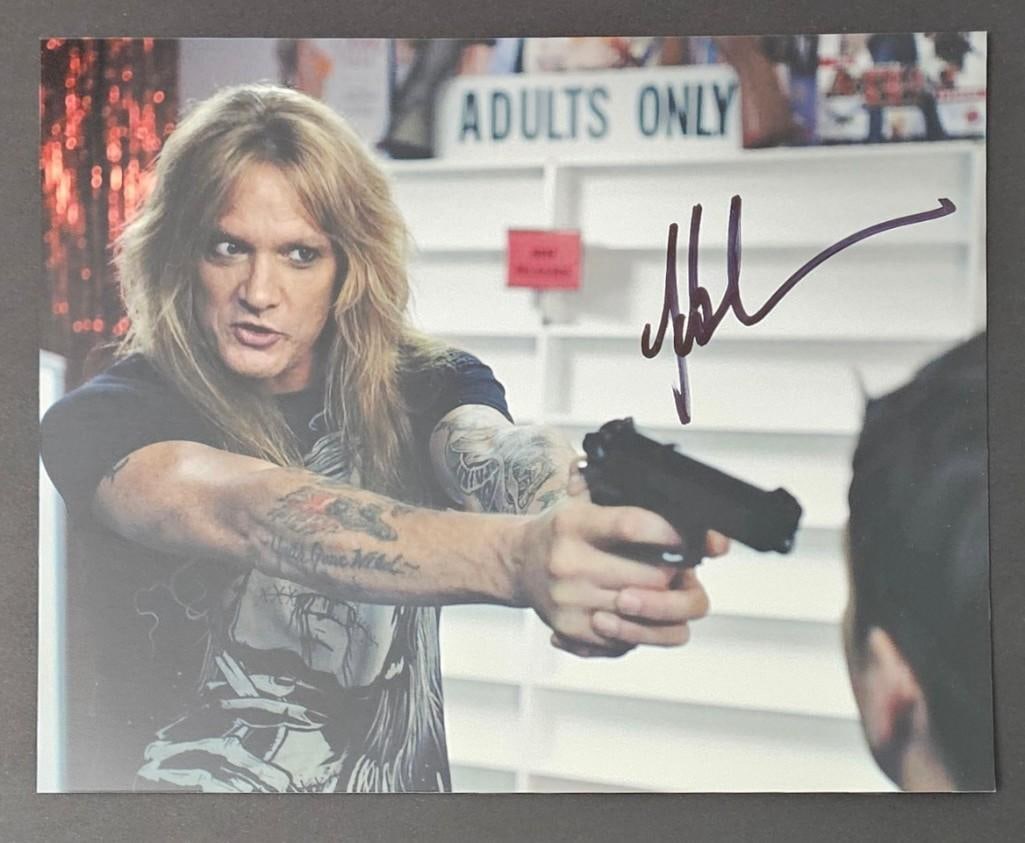 Skid Row: Sebastian Bach Signed 10" x 8" Photo in "The Trailer Park Boys" (Third Party Guaranteed): Color 10" x 8" photo of Skid Row's Sebastian Bach as himself in the Trailer Park Boys television show, signed in black felt tip marker by musician Sebastian Bach. In fine condition.ProvenanceEaton &