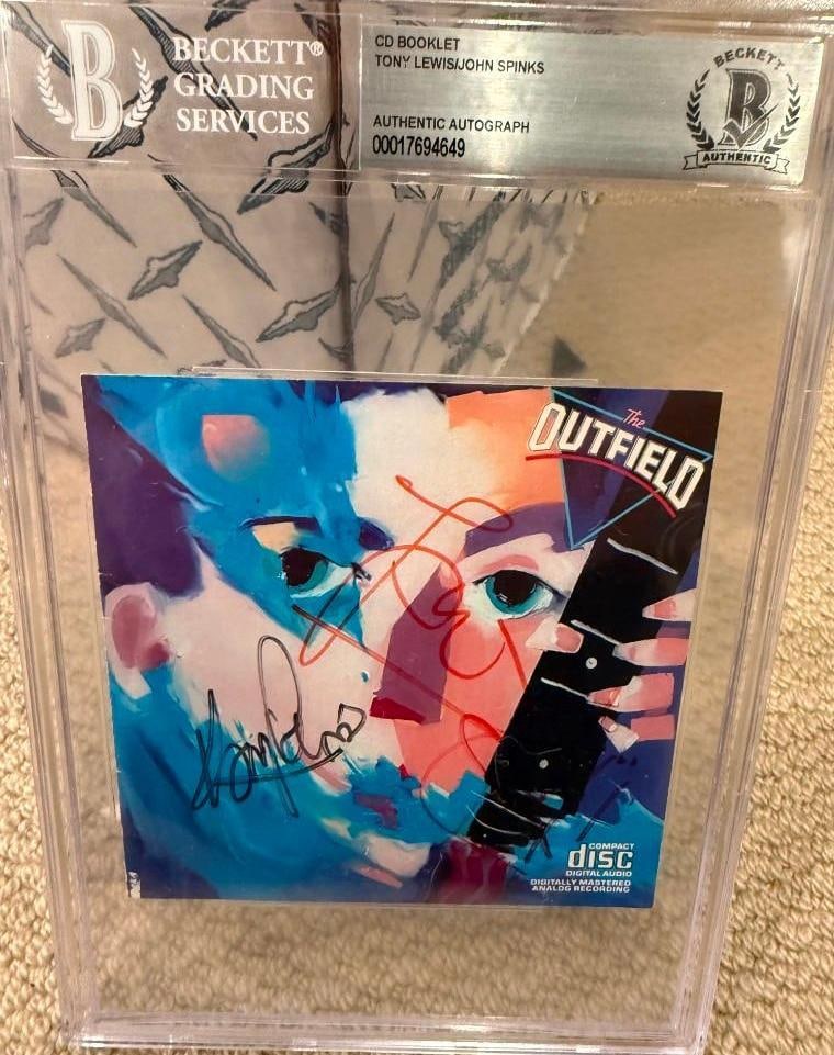 The Outfield Group Signed Slabbed "Play Deep" CD Booklet (2 Sigs) (Beckett/BAS Authentication) (1 of 1)