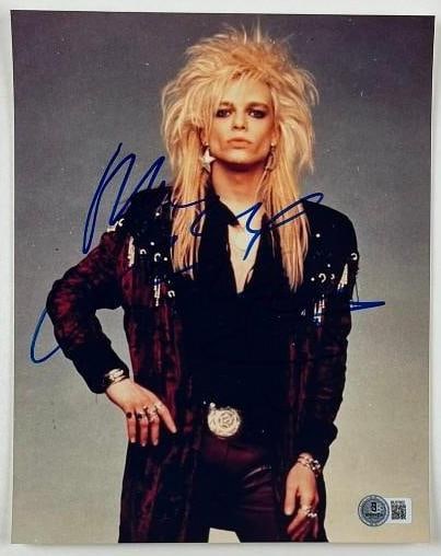 Hanoi Rocks: Michael Monroe Signed 10" x 8" Photo (Beckett/BAS Authentication): Color 10" x 8" photo signed in blue felt tip marker by Hanoi Rocks front man Michael Monroe. In fine condition. Obtained in-person. Authenticated by Beckett/BAS, with their official hologram affixed t