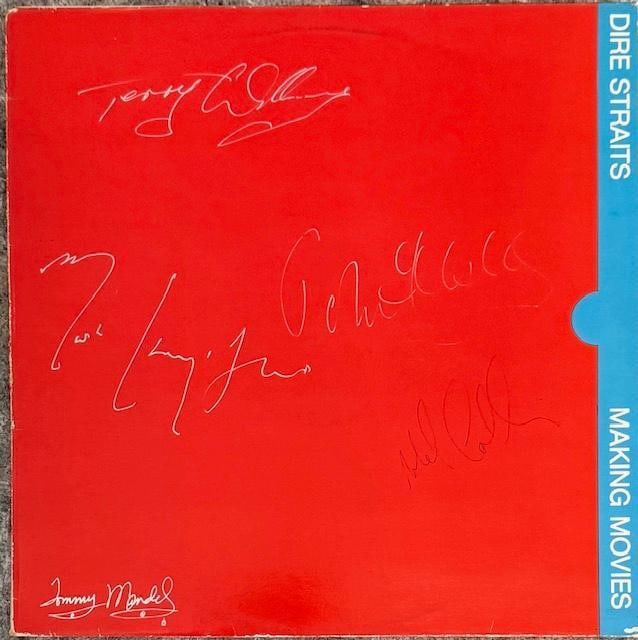 Dire Straits Group Signed "Making Moves" LP Album (5 Sigs) (Third Party Guaranteed): "Making Moves" LP album signed on the cover in silver felt tip marker and black ballpoint pen by Dire Straits band members Mark Knopfler, John Issley, Terry Williams, Mel Collins, and Tommy Mandel.