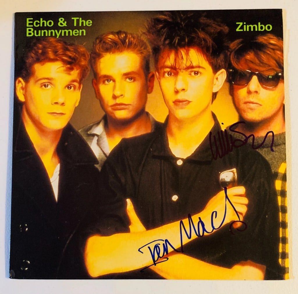 Echo & The Bunnymen Dual Signed "Zimbo" LP Album (2 Sigs) (Beckett/BAS): "Zimbo" LP album signed on the cover in blue felt tip marker by Echo & The Bunnymen band members Ian McCulloch and Will Sergeant. Measuring approximately 12" x 12" and in fine condition. Obtained in-p