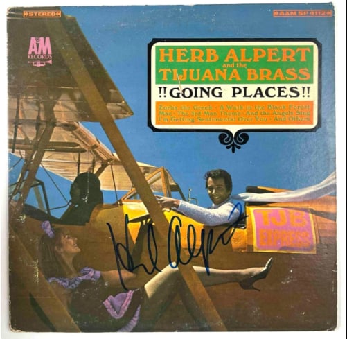 Herb Alpert Signed "Going Places!!" Album (Beckett/BAS Authentication): "Going Places!!" album signed on the cover in blue felt tip marker by musician Herb Alpert. Measuring approximately 12" x 12" and in very good condition, with some signs of handling wear. Record is