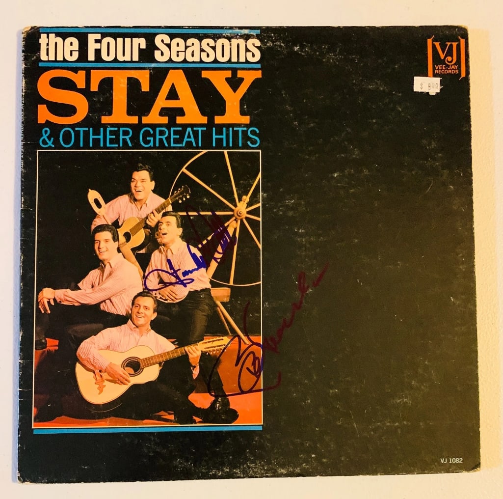 The Four Seasons: Frankie Valli & Bob Gaudio Signed "Stay" Album (2 Sigs) (Beckett): "Stay" LP album signed on the cover in blue felt tip marker by The Four Seasons band members Frankie Valli and Bob Gaudio. Measuring approximately 12" x 12" and in very good condition, with some