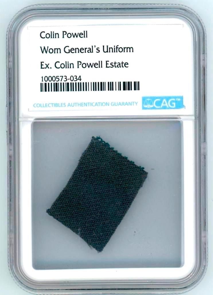 Colin Powell Worn Uniform Fabric Swatch (Ex-Powell Estate, CAG): Black fabric swatch, 1 x .75," from a uniform worn by General Colin Powell, encapsulated by CAG to 2.375" x 3.375". Accompanied by copies of provenance. Powell was a four-star general, U.S. Secretary