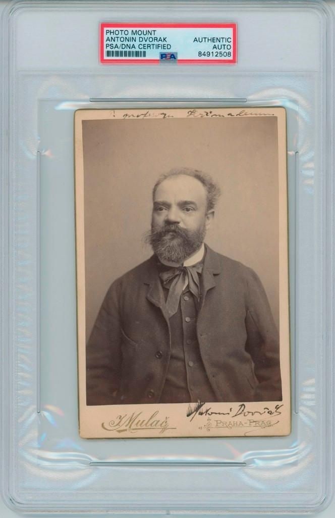 Antonin Dvorak Signed Cabinet Card (PSA/DNA Encapsulated): Striking 6.25" x 4.25" cabinet card portrait of celebrated Czech composer Antonin Dvorak, shown in a formal three-piece suit with his signature full beard and neckcloth. Boldly signed “Antonin